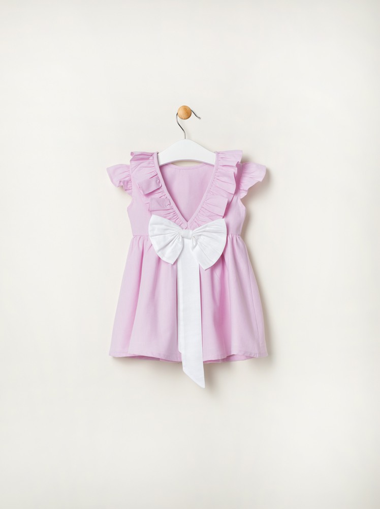 Girl’s pink bow dress