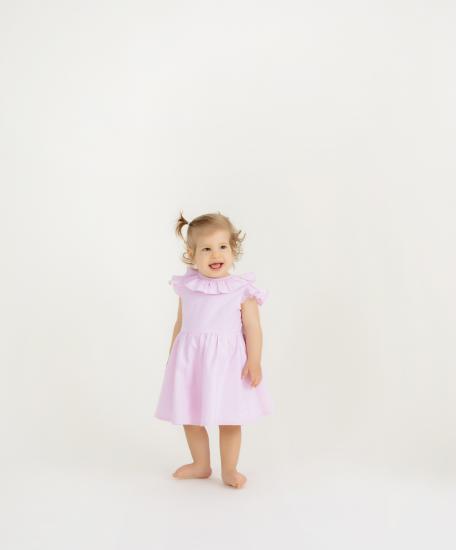 Girl’s pink bow dress